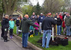 Group of people at tree planting event